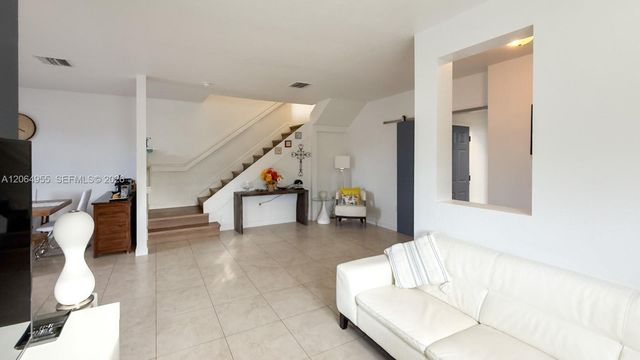 1001 NE 208th St ., Miami, FL 33179