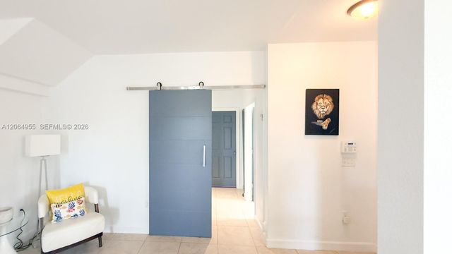 1001 NE 208th St ., Miami, FL 33179