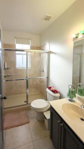 1001 NE 208th St ., Miami, FL 33179