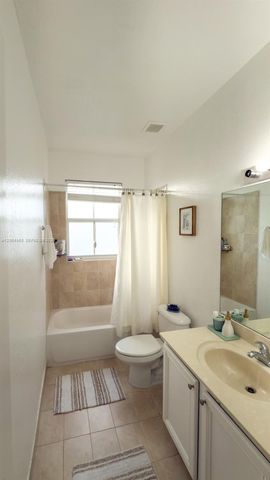 1001 NE 208th St ., Miami, FL 33179