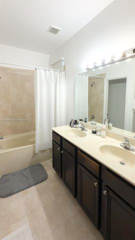 1001 NE 208th St ., Miami, FL 33179