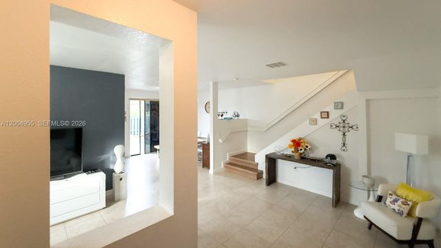 1001 NE 208th St ., Miami, FL 33179