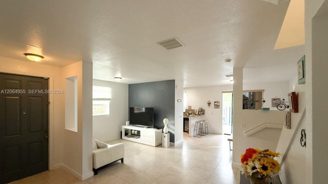 1001 NE 208th St ., Miami, FL 33179