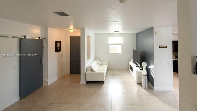 1001 NE 208th St ., Miami, FL 33179