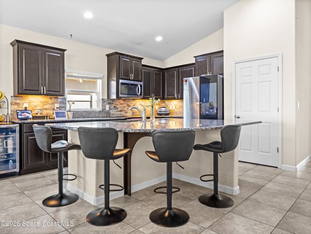 1243 Musgrass Circle, West Melbourne, FL 32904