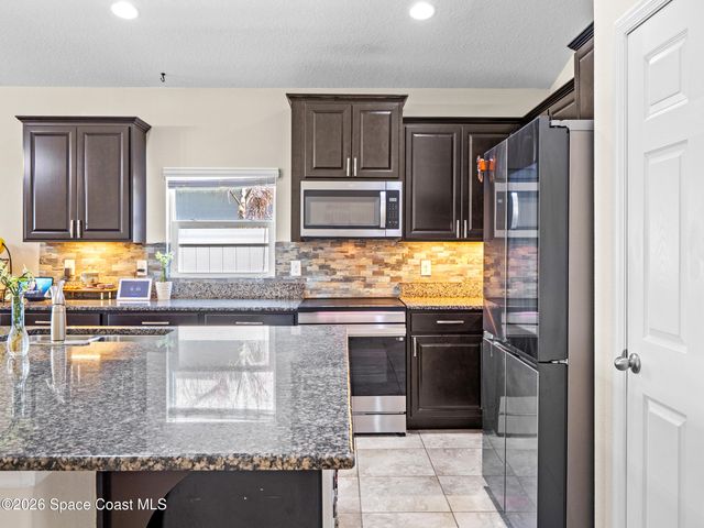 1243 Musgrass Circle, West Melbourne, FL 32904