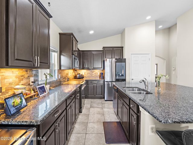 1243 Musgrass Circle, West Melbourne, FL 32904