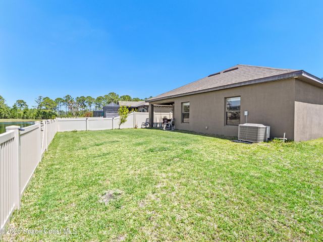 1243 Musgrass Circle, West Melbourne, FL 32904