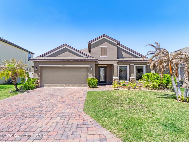 1243 Musgrass Circle, West Melbourne, FL 32904