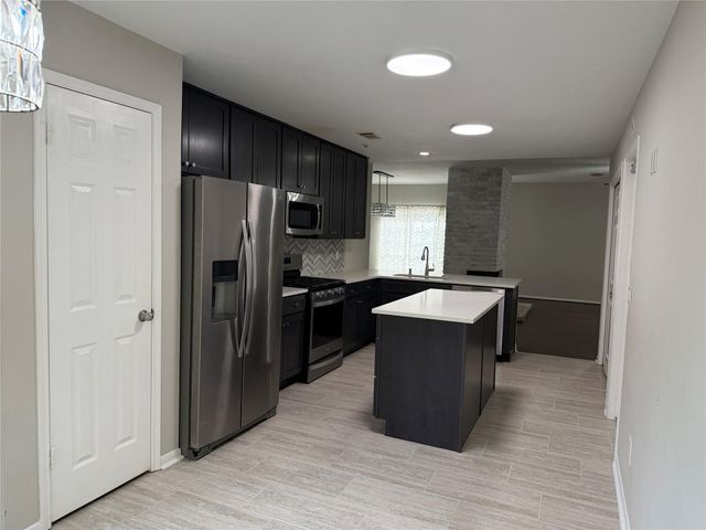 75 E Village Knoll Circle, The Woodlands, TX 77381