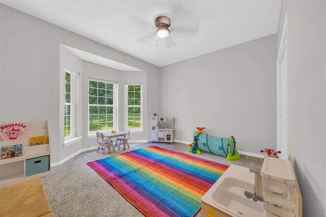 2722 Royal Oaks Dr NW, Swisher, IA 52338