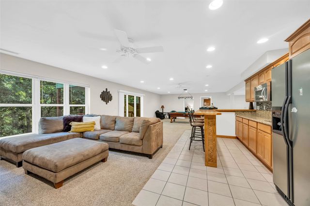 2722 Royal Oaks Dr NW, Swisher, IA 52338