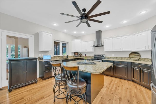 2722 Royal Oaks Dr NW, Swisher, IA 52338