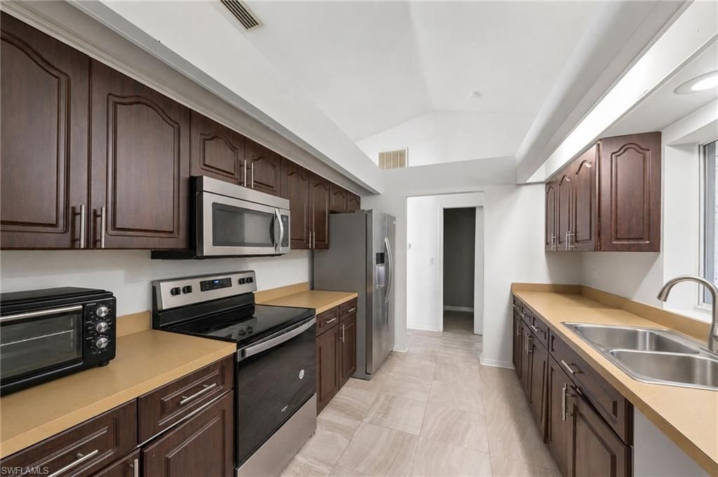 Image 7 of property listing at 3001 1st PL, Cape Coral, FL 33914