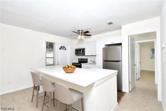 44 Tangelo CT, Lehigh Acres, FL 33936