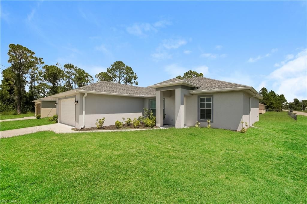 2900 7th ST W, LEHIGH ACRES, FL 33971 — photo 2