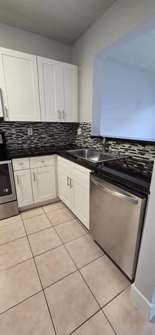 5117 Meadow Oaks Drive, Coconut Creek, FL 33073