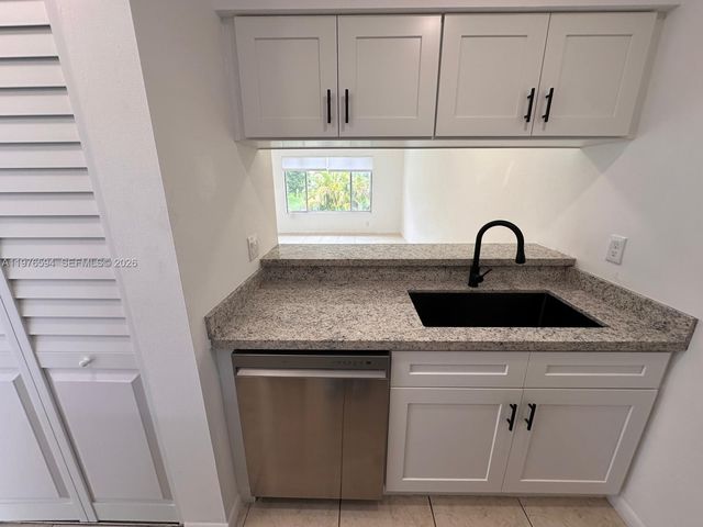 910 Twin Lakes Dr 8-K, Coral Springs, FL 33071