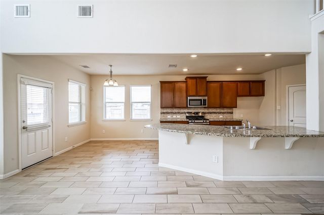 10003 Open Slope Court, Humble, TX 77396