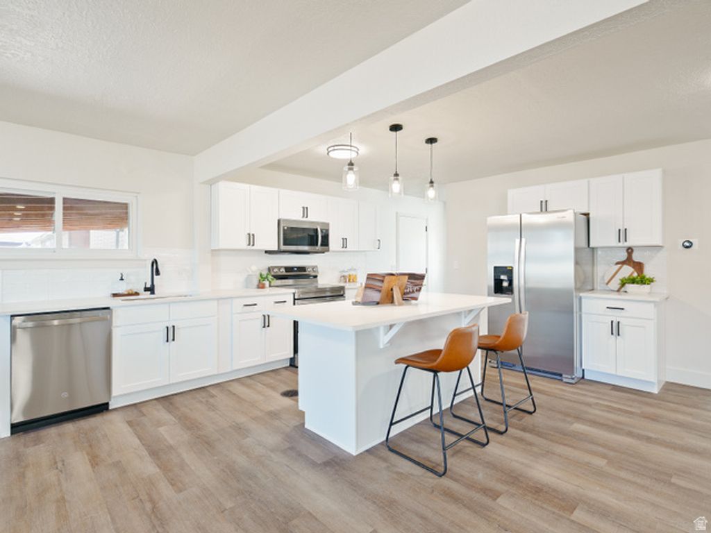 Image 2 of property listing at 5229 S KINGSWOOD DR, Taylorsville, UT 84129