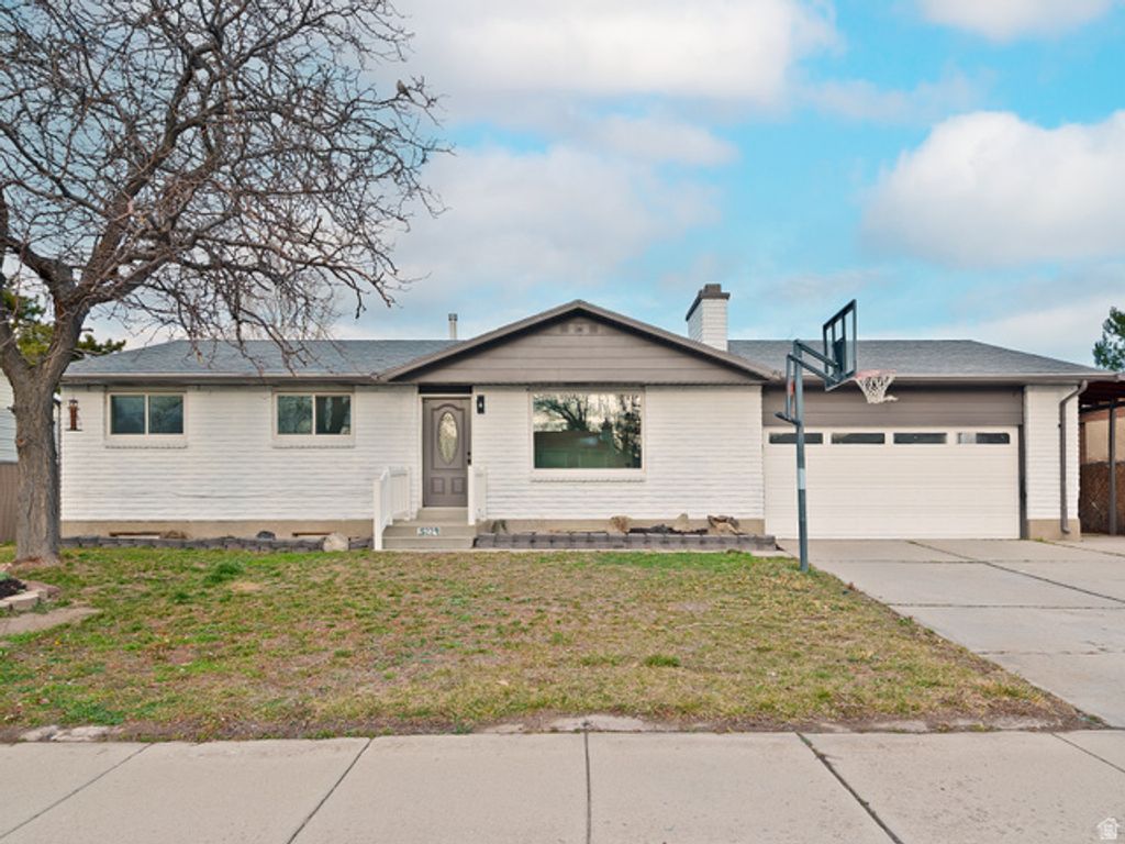 Image 6 of property listing at 5229 S KINGSWOOD DR, Taylorsville, UT 84129