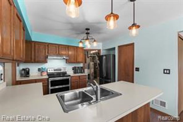 38563 Palm Meadow Drive, Clinton Township, MI 48036