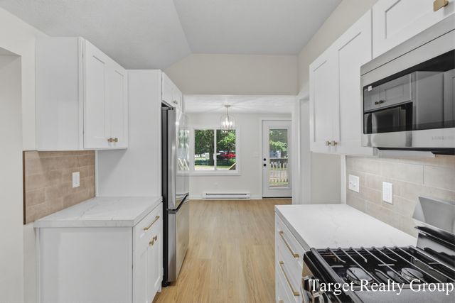 8660 Merry Drive NE, Rockford, MI 49341