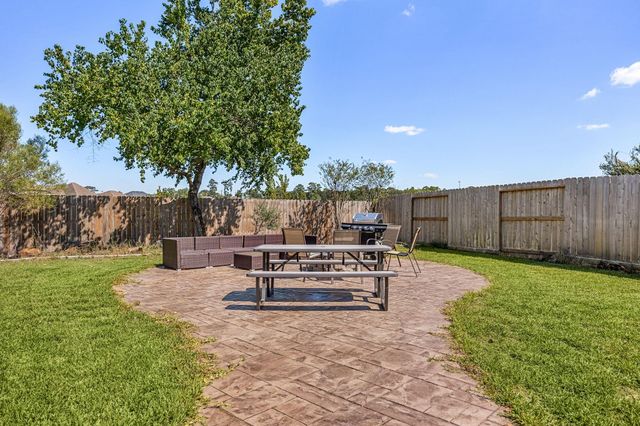 6330 Whistling Pines Drive, Spring, TX 77389