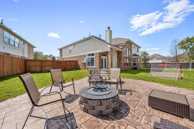 6330 Whistling Pines Drive, Spring, TX 77389