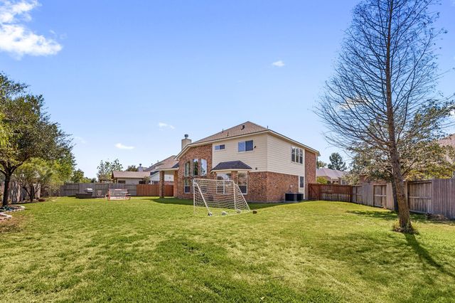 6330 Whistling Pines Drive, Spring, TX 77389