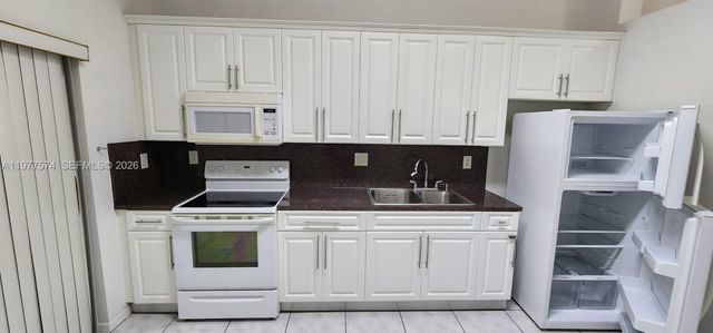 6900 NW 179th St 210-1, Hialeah, FL 33015