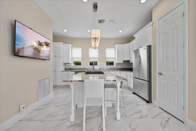 208 Glacier Street, Palm Beach Gardens, FL 33410