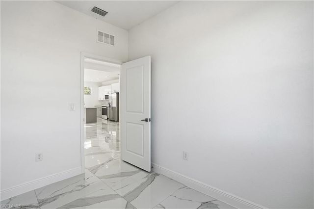 406 Genoa AVE S, Lehigh Acres, FL 33974