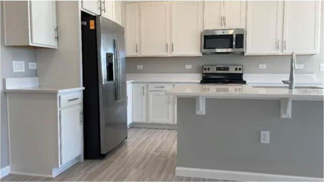 1124 SUGARWOOD STREET, Davenport, FL 33837