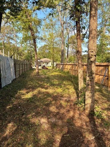 14964 Wyatt Earp Ln, Willis, TX 77378