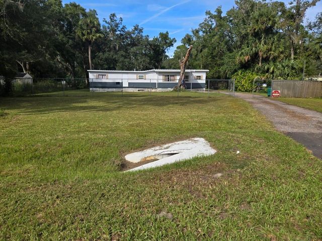 25309 BARTHOLOMEW STREET, Christmas, FL 32709