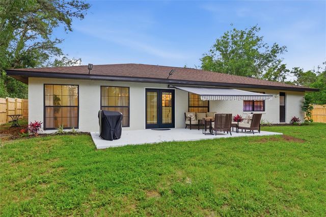 1820 N MERRICK DRIVE, Deltona, FL 32738