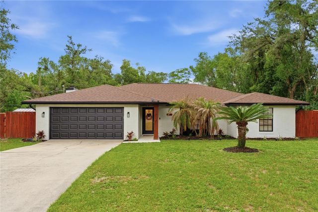 1820 N MERRICK DRIVE, Deltona, FL 32738