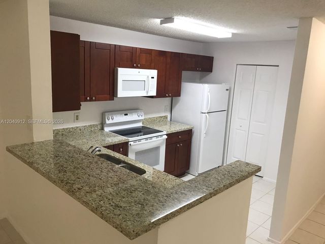 11229 W Atlantic Boulevard 101, Coral Springs, FL 33071