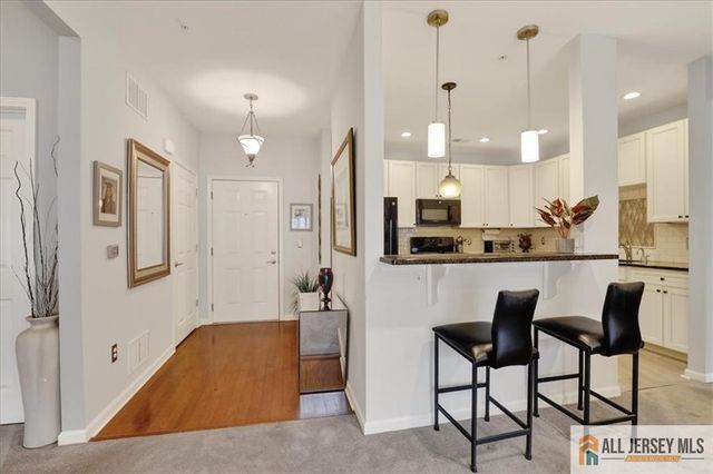 215 Bloomsbury Drive, Morganville, NJ 07751