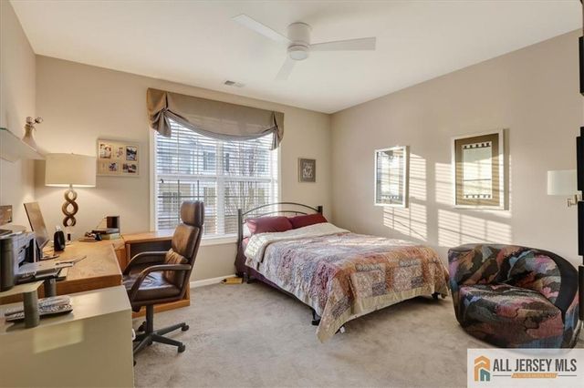 215 Bloomsbury Drive, Morganville, NJ 07751