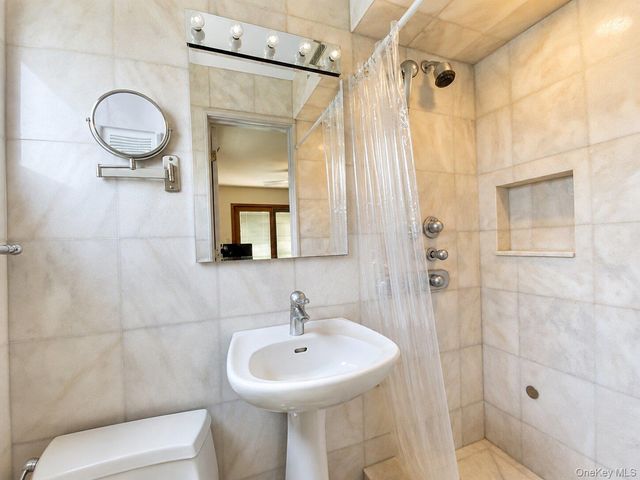209-42 26th Avenue, Bayside, NY 11360