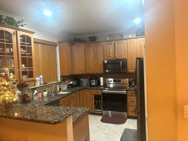 12425 NW 54th Ct, Coral Springs, FL 33076