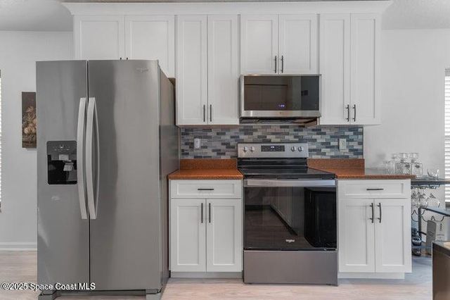 377 Wishing Well Circle SW, Palm Bay, FL 32908