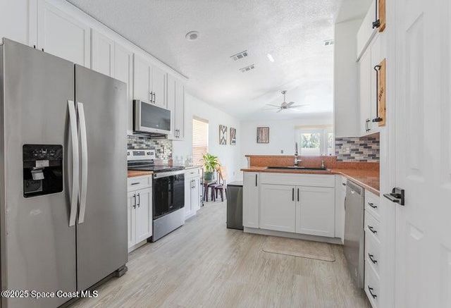 377 Wishing Well Circle SW, Palm Bay, FL 32908