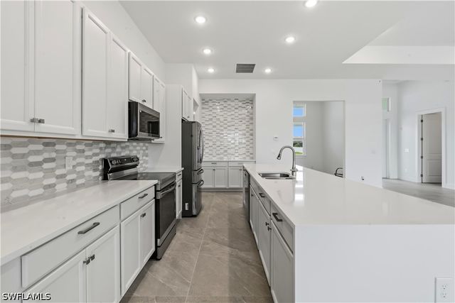 1241 NW 33RD AVE, Cape Coral, FL 33993