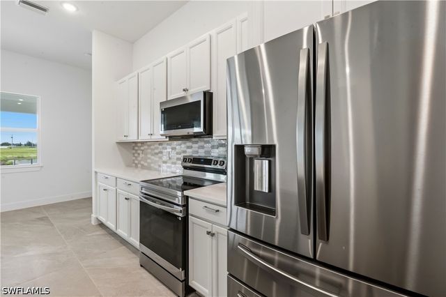 1241 NW 33RD AVE, Cape Coral, FL 33993