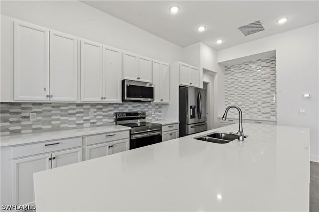 1241 NW 33RD AVE, Cape Coral, FL 33993