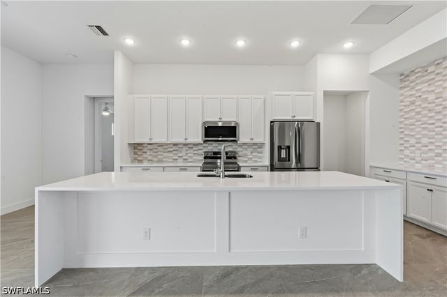 1241 NW 33RD AVE, Cape Coral, FL 33993