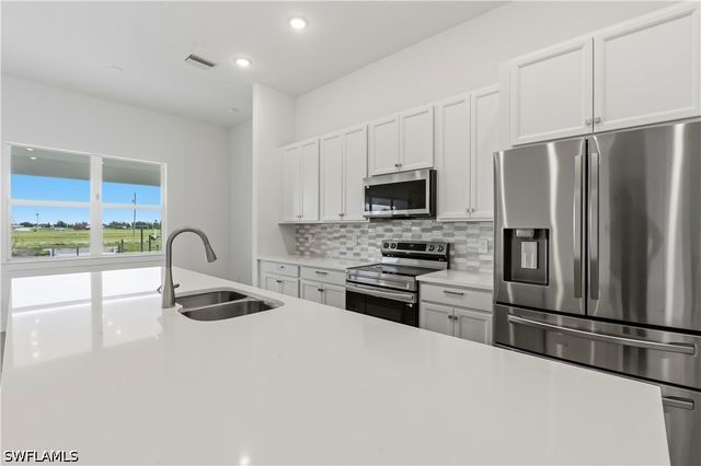 1241 NW 33RD AVE, Cape Coral, FL 33993